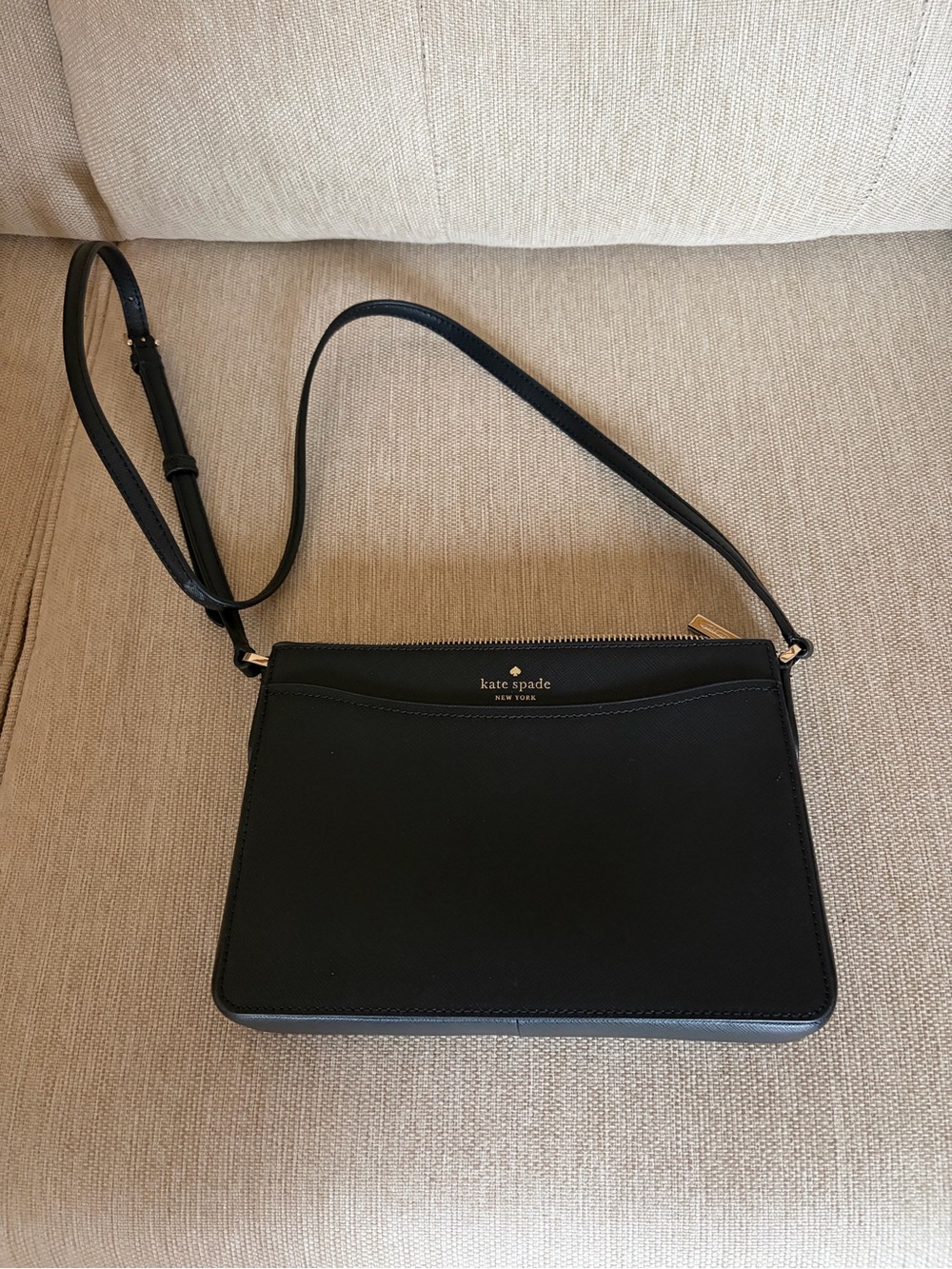 kate spade black leather crossbody with gold logo
